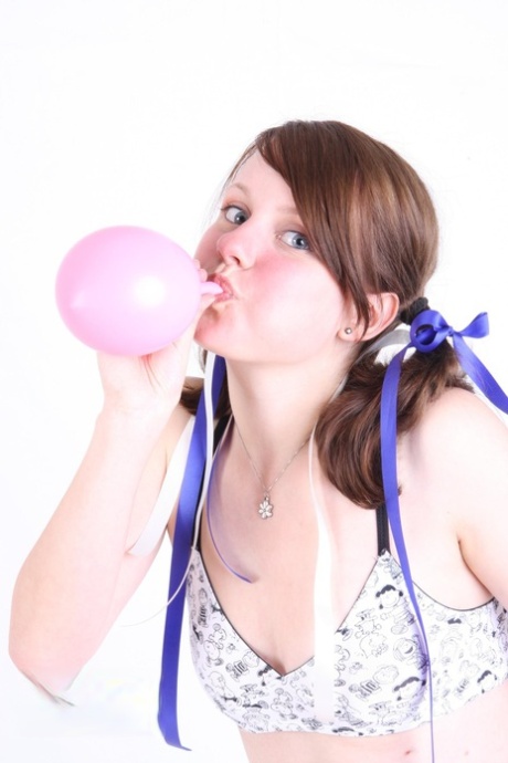 Amateur girl looses her small tits after blowing up a balloon 94832768