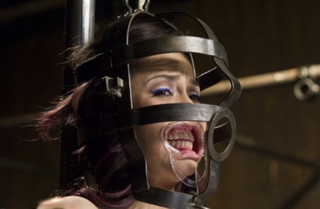 Naked girl is tortured and penetrated while being subjected to tight bondage 62167057